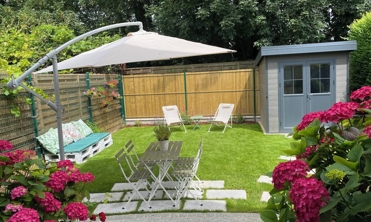 Domont House | Maisonette with garden