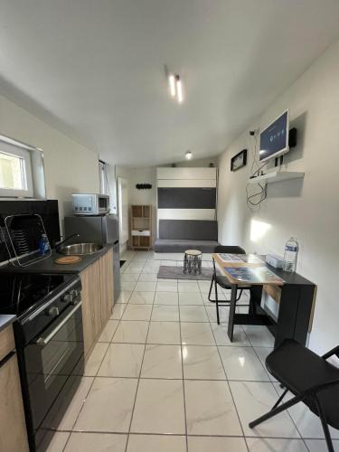 Verton House | Studio avec jardin clos