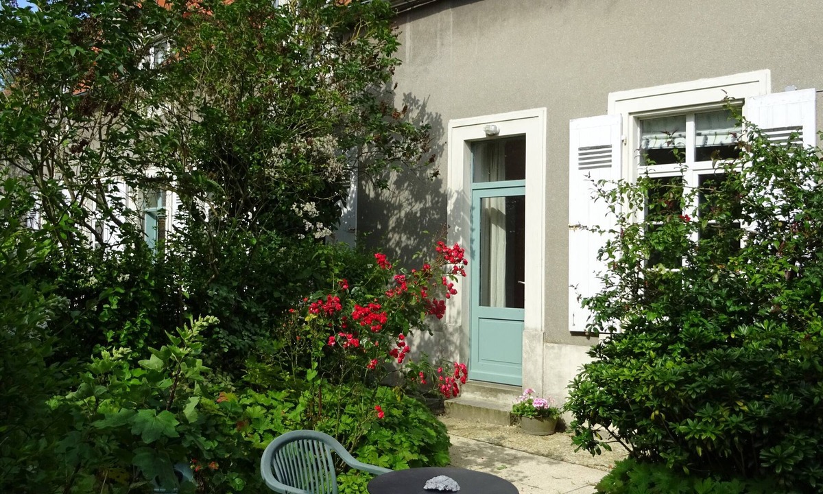 Wimille Apartment | The Artist's Den. Charming apartment nestled in lush greenery.
