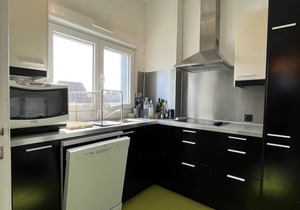 Large 80 m2 2-bedroom duplex apartment in town center