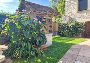 Maison de charme à Sainte-Geneviève-lès-Gasny avec jardin
