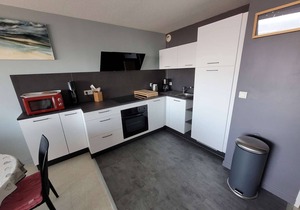 Seafront Apartment with Elevator, Parking, and Balcony
