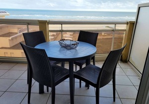 Seafront Apartment with Elevator, Parking, and Balcony