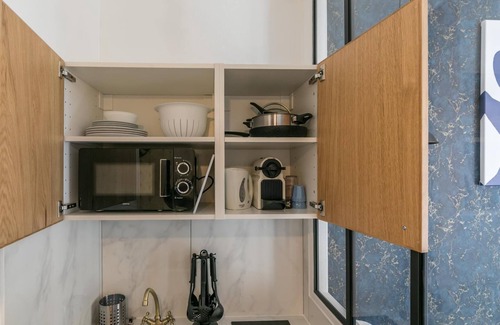 Quartier du Faubourg-Montmartre Apartment | Opéra - Rossini 25: cosy flat for 2