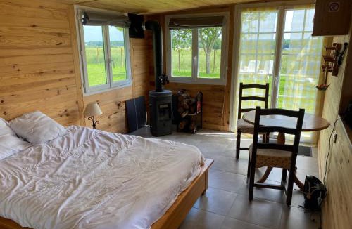 Manou Ski Chalet | Chalet autonome à louer sur terrain de loisir de 2000m2 avec étang privé