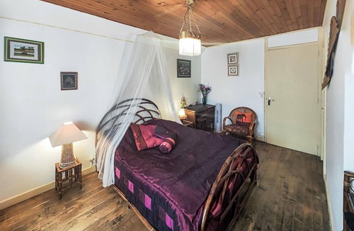 Angles House | Spend a relaxing vacation in this inviting cottage with rustic charm.