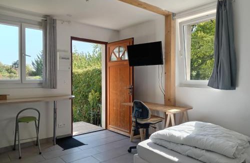 Sainte-Anne - Faubourg Noyon Apartment | Studio neuf avec jardin partagé