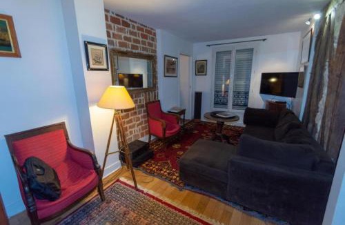 Quartier du Faubourg-Montmartre Apartment | Very French Two Bedroom in the Heart of Paris