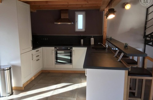 Hasnon Cottage | Wooden Chalet with Private Garden, Hot Tub, and Parking in Charming Village