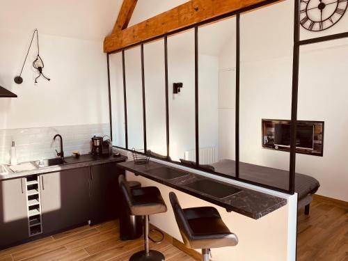 Photo of Kitchen in Saint-Quentin-en-Tourmont