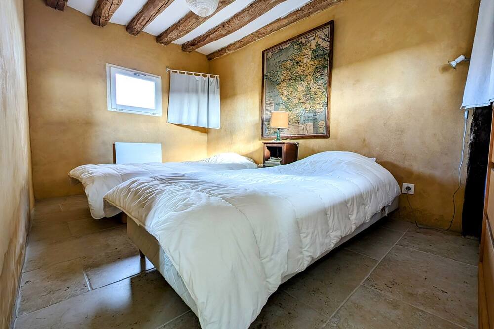 Photo of Bedroom in Les Baux-de-Breteuil