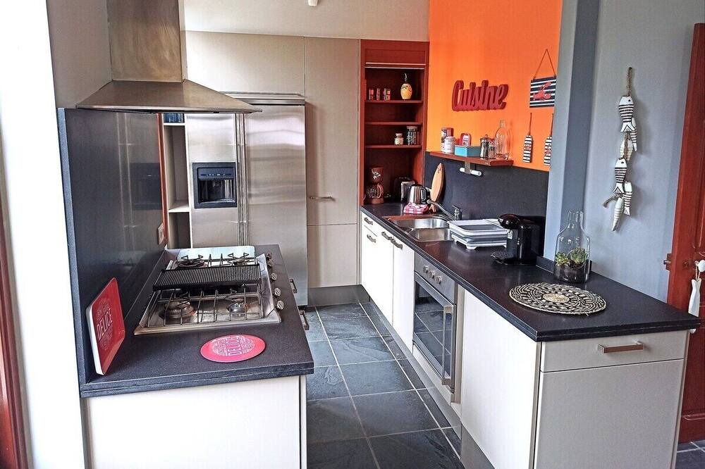 Photo of Kitchen in Saint-Quentin-en-Tourmont