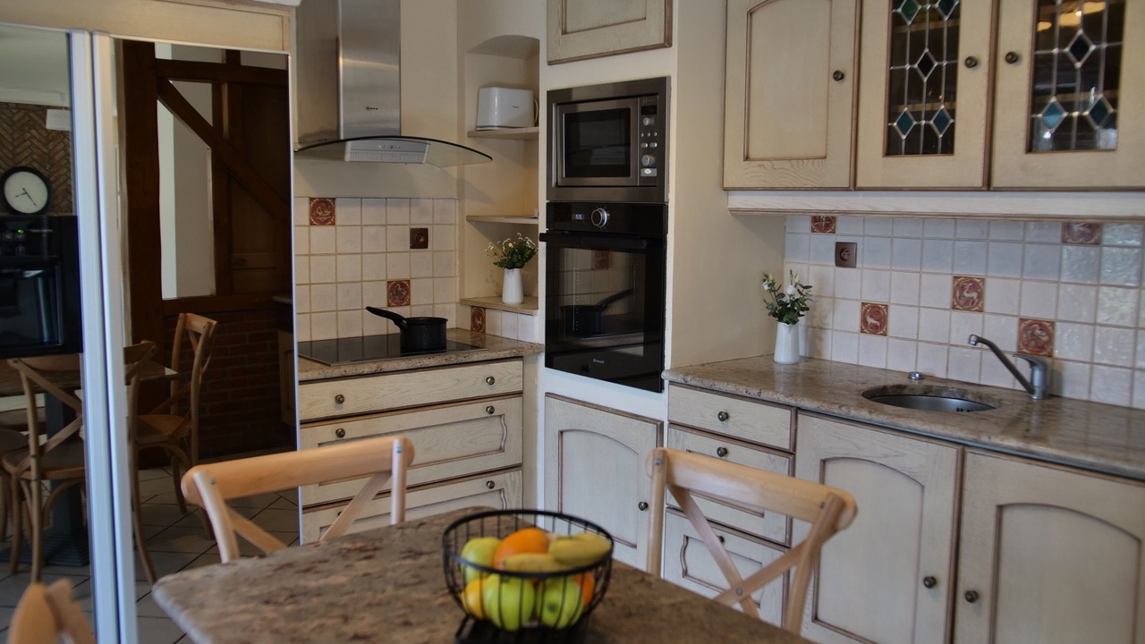 Photo of Kitchen in Saint-Quentin-en-Tourmont