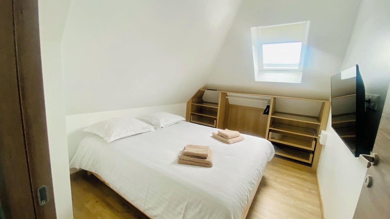 Photo of Bedroom in Saint-Quentin-en-Tourmont