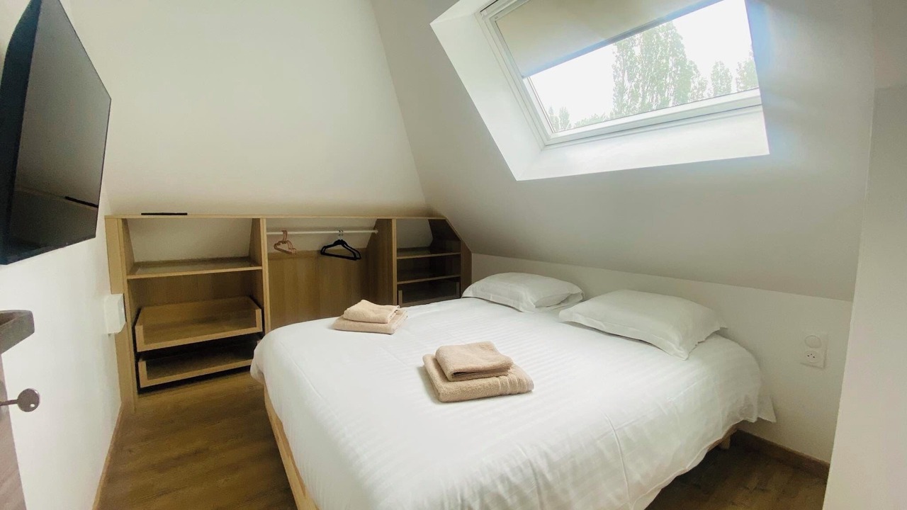 Photo of Bedroom in Saint-Quentin-en-Tourmont