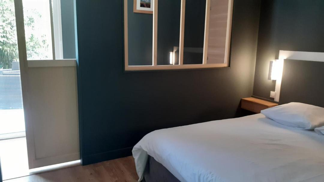 Photo of Bedroom in Saint-Quentin-en-Tourmont