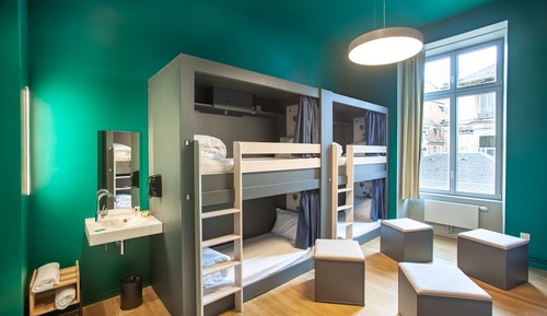 Room of 8 beds with shared bathroom