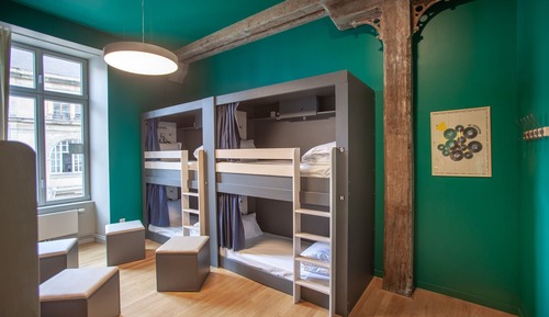 Bed in 6 bed room with shared bath room