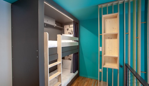 Bed in 8 bed room with shared bathroom