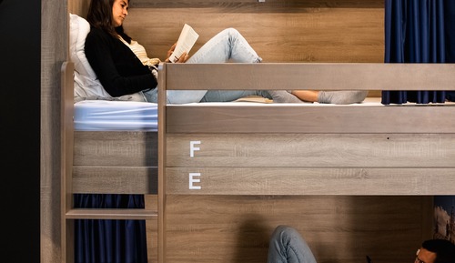 Bed in 10 bed room with shared bathroom