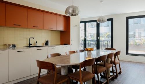 Four-Bedroom Apartment with Balcony 